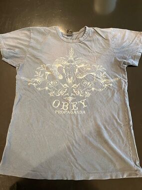 Obey Men’s Short-Sleeve Graphic Tee in Light Blue with Cream Print
